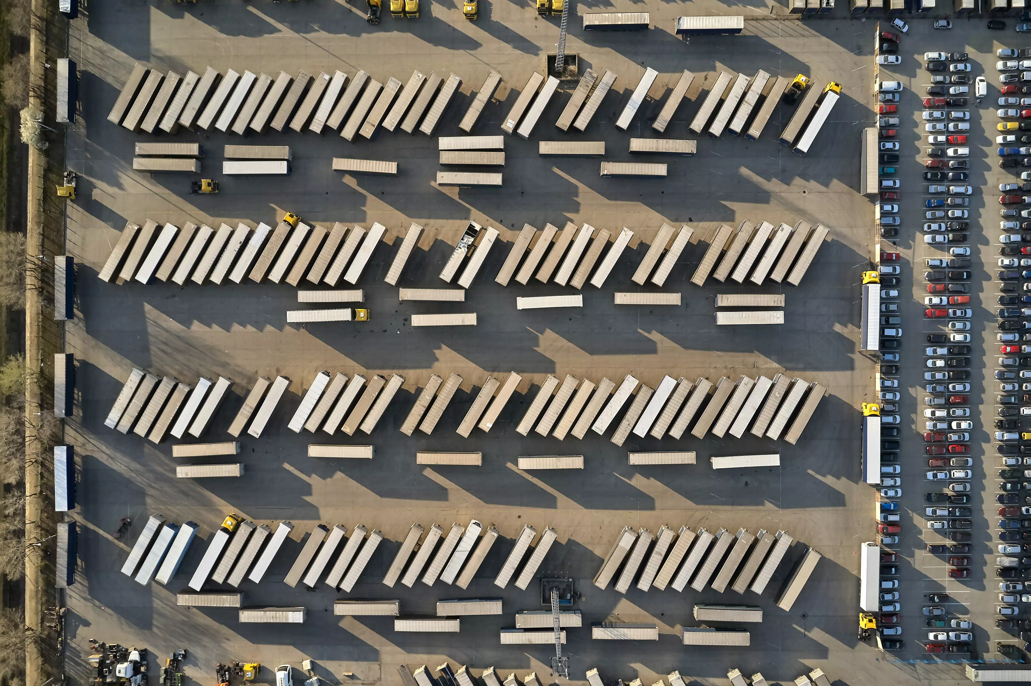 Logistic center with trucks and trailers