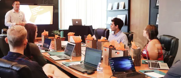 person having a presentation at a large meeting