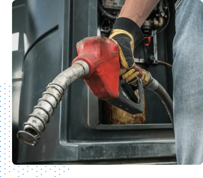 Gas pump next to a truck